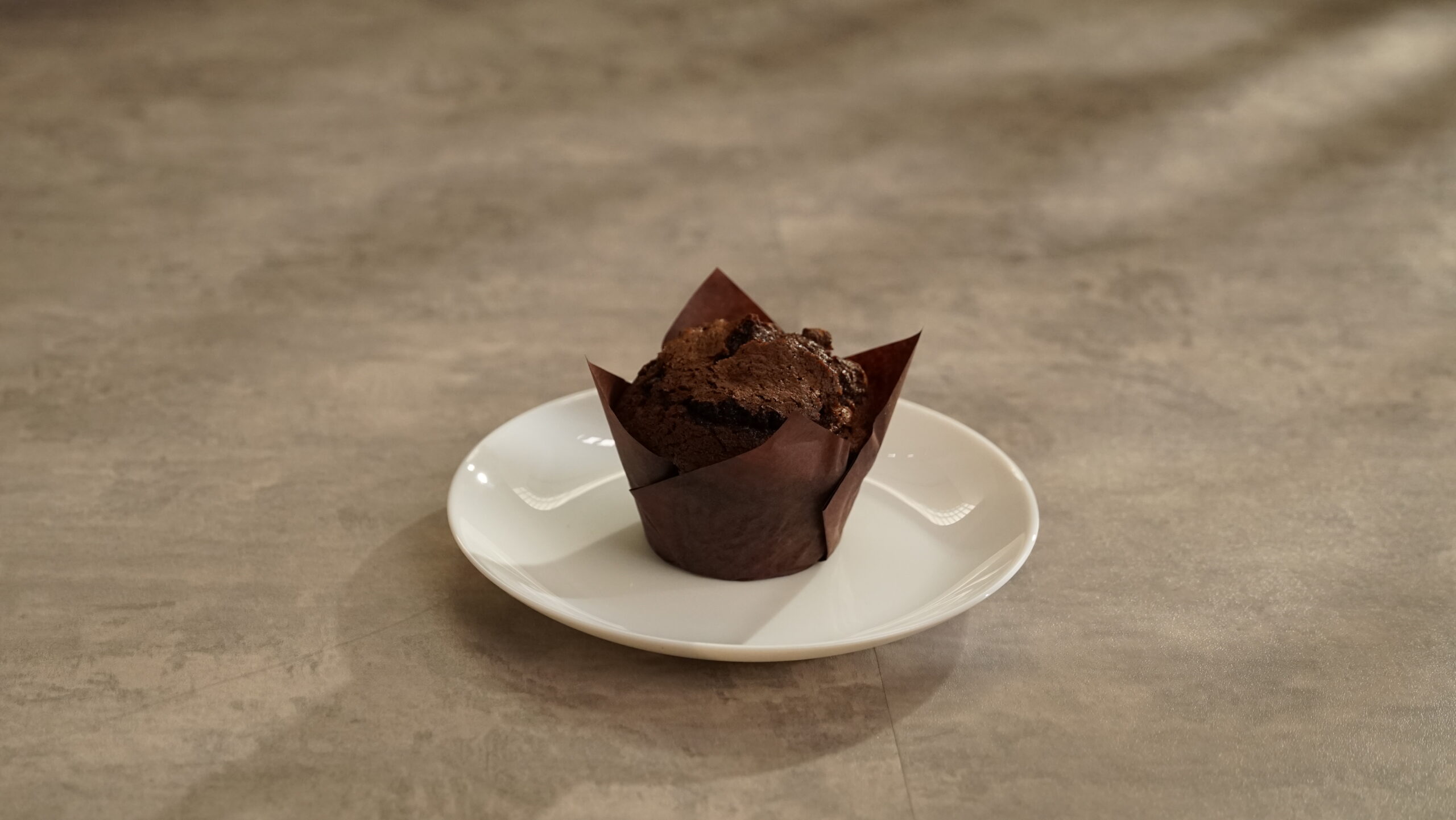 Lifestyle shot of CHOCOLATE CHUNK MUFFIN 5.0 OZ