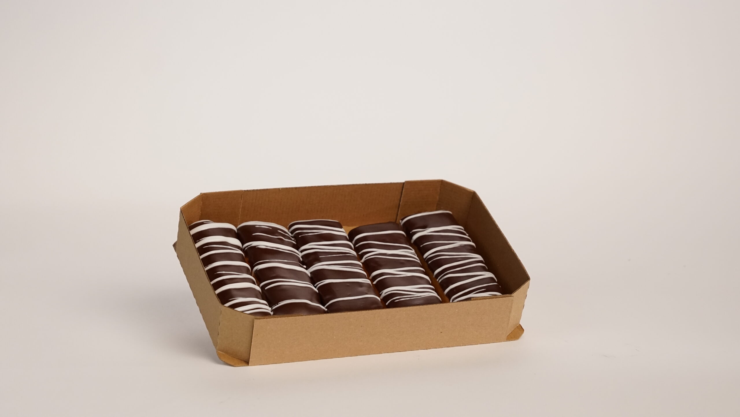 Tray of CHOCOLATE ICED BUTTER CRÈME FILLED LONG JOHN 5.2 OZ